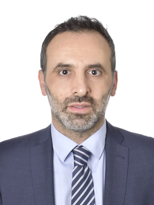 Porträtt av Yusuf Aydin